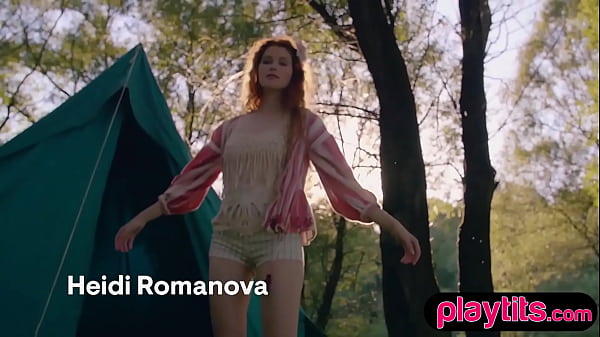 Petite redhead Latvian MILF strips nude outside her tent outdoors